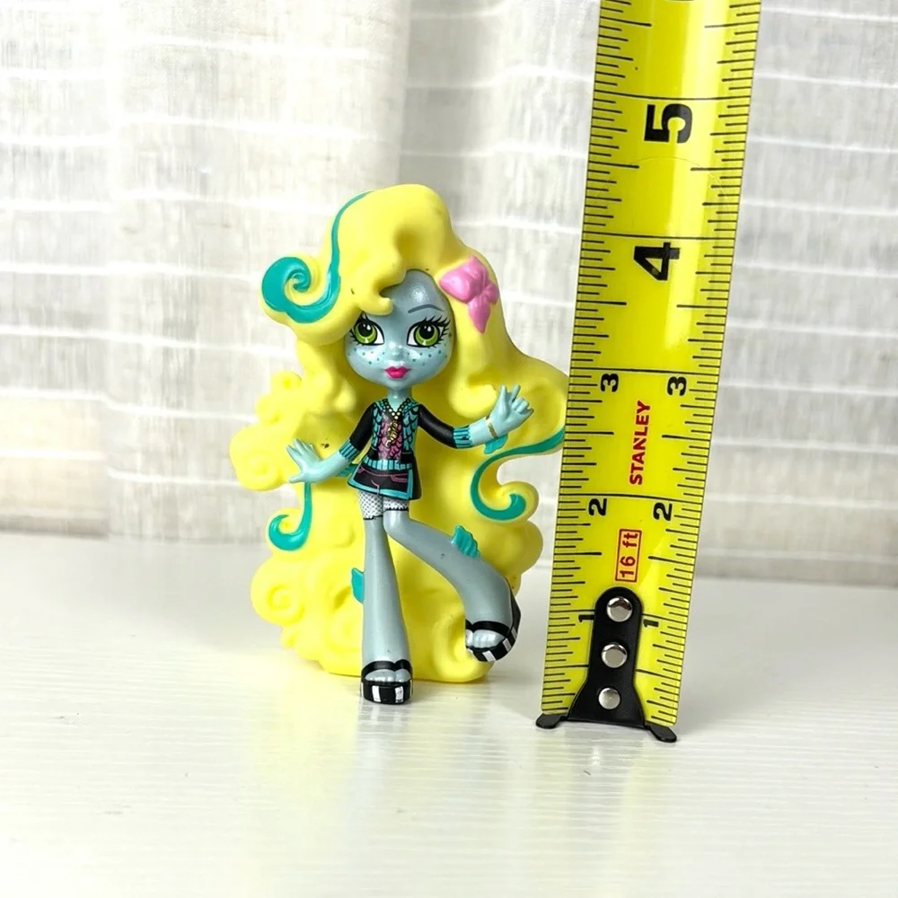 Monter High Lagoona Blue Figure Dol 4” with Yellow Hair and Pink Bow
